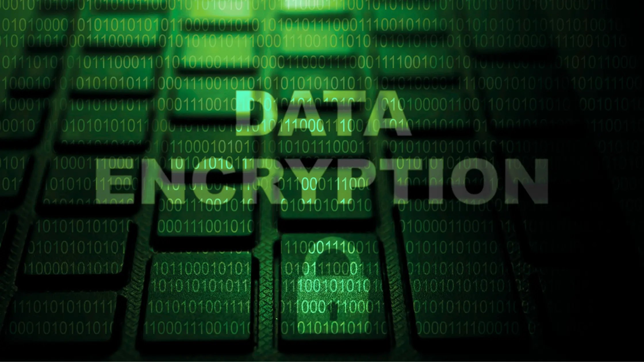 Glowing green text 'DATA ENCRYPTION' over a keyboard with binary code, representing cybersecurity and encrypted data protection.